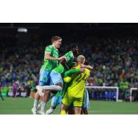 Sounders FC react after their penalty kick win