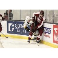 Kingston Frontenacs' Ben Pickell battles Peterborough Petes' Martin Matejicek