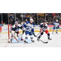 Syracuse Crunch's Dylan Duke and Hartford Wolf Pack's Dylan Garand and Connor Mackey on game night