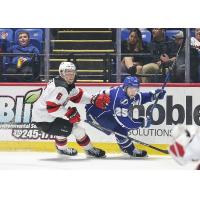 Utica Comets' Colton White versus Syracuse Crunch's Dylan Duke