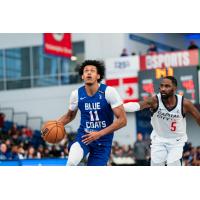 Delaware Blue Coats guard Jeff Dowtin eyes the hoop