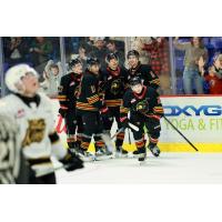 Vancouver Giants gather following a goal against the Brandon Wheat Kings