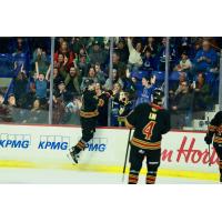 Vancouver Giants right wing Tyler Thorpe celebrates with the fans