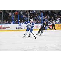 Syracuse Crunch's Gage Goncalves and Cleveland Monsters' Justin Pearson in action