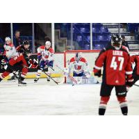 Vancouver Giants pressure the Spokane Chiefs' net