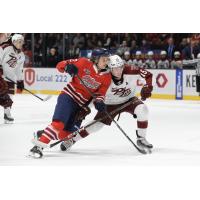 Peterborough Petes defenceman Carson Cameron (right)