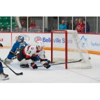 Cleveland Monsters' Jet Greaves and Belleville Senators' Cole Reinhardt in action