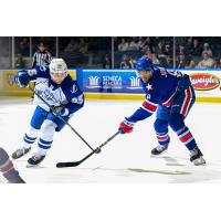 Syracuse Crunch forward Dylan Duke (left) vs. the Rochester Americans