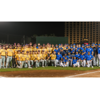 Biloxi Shuckers pose with the Pearl River Community College Wildcats