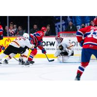 Vancouver Giants goaltender Burke Hood stops the Spokane Chiefs