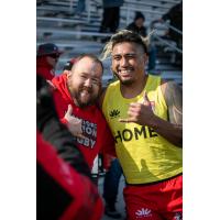 Lance Williams of the Utah Warriors poses with a fan