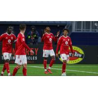 Phoenix Rising reacts after a goal